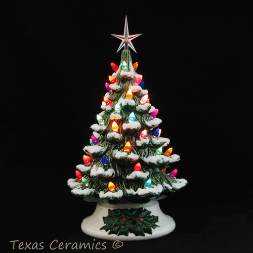 12 inch tall ceramic Christmas tree with snow and color lights